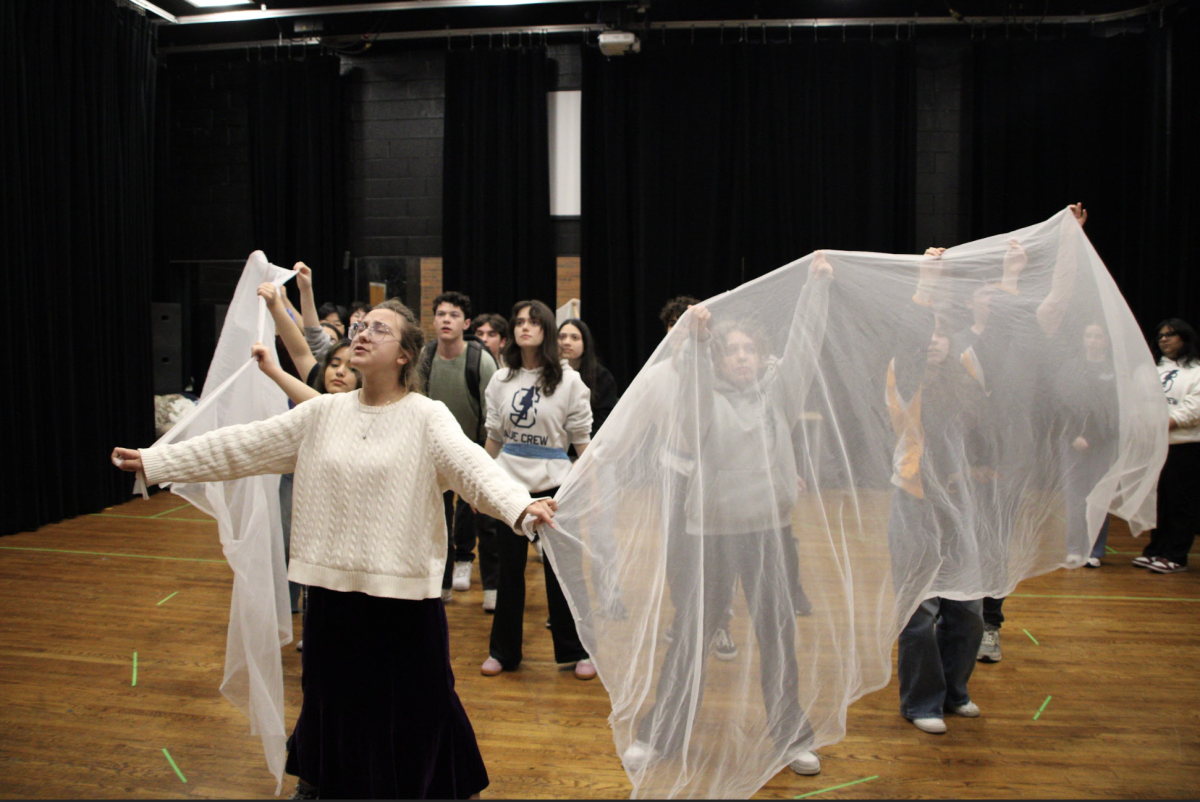 IRONING OUT CHOREO: Students, (top) senior Isabel Arranz and sophomore Dean Tranas, (middle) senior Amy Patton, (bottom) left to right, sophomore Dean Tranas, senior Isabel Arranz, and senior Charlie Chasen, practice blocking for their upcoming performance, A Wrinkle in Time, in the Drama Dance Room (DDR). The Spring Play will be showcased in the Auditorium from April 15-18.