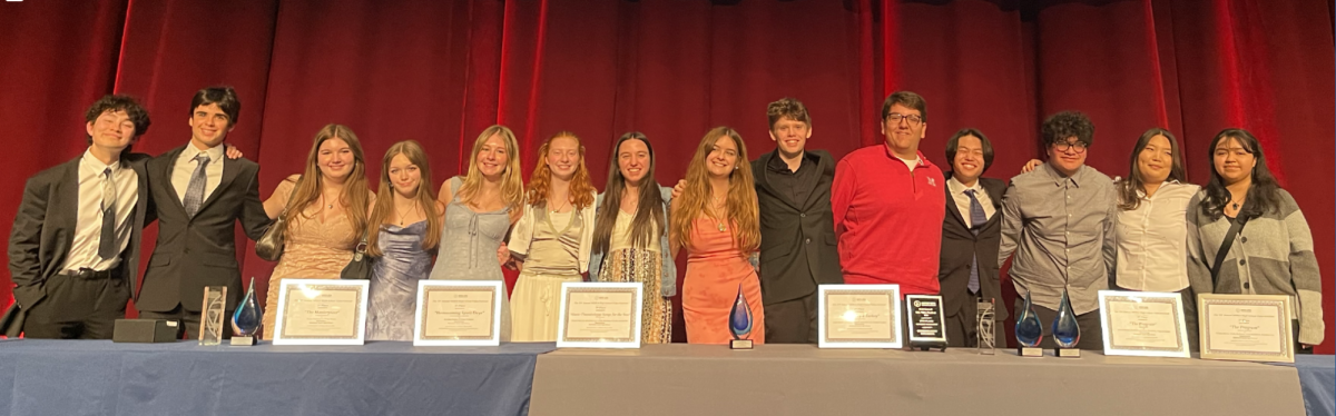 ATV AWARDS: South Advanced TV and Film students stand together with the awards they received from the National Academy of Television Arts and Sciences (NATAS) and from the Midwest Media Educators Association (MMEA). At NATAS, three projects won Crystal Pillars, the highest award given, and at MMEA eight projects placed. Photo courtesy of Julie Benca
