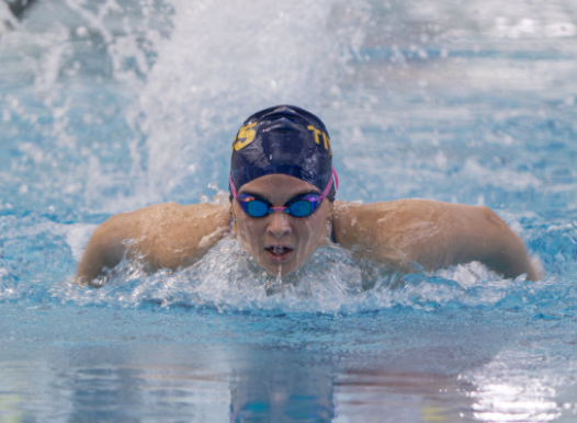 STAR SWIMMER: Senior Briana Cornoiu is pictured at a girls' varsity swim practice on Sept. 23. After four years with the varsity team, Cornoiu has learned the importance of a strong team.
